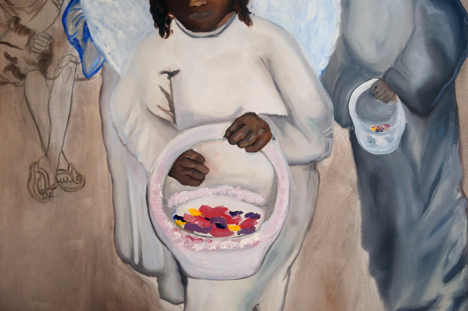 detalhe: cesta de pétalas nas mãos da menina